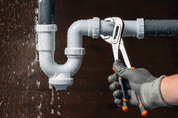 Professional Drain Cleaning technician working in Elmo, TX
